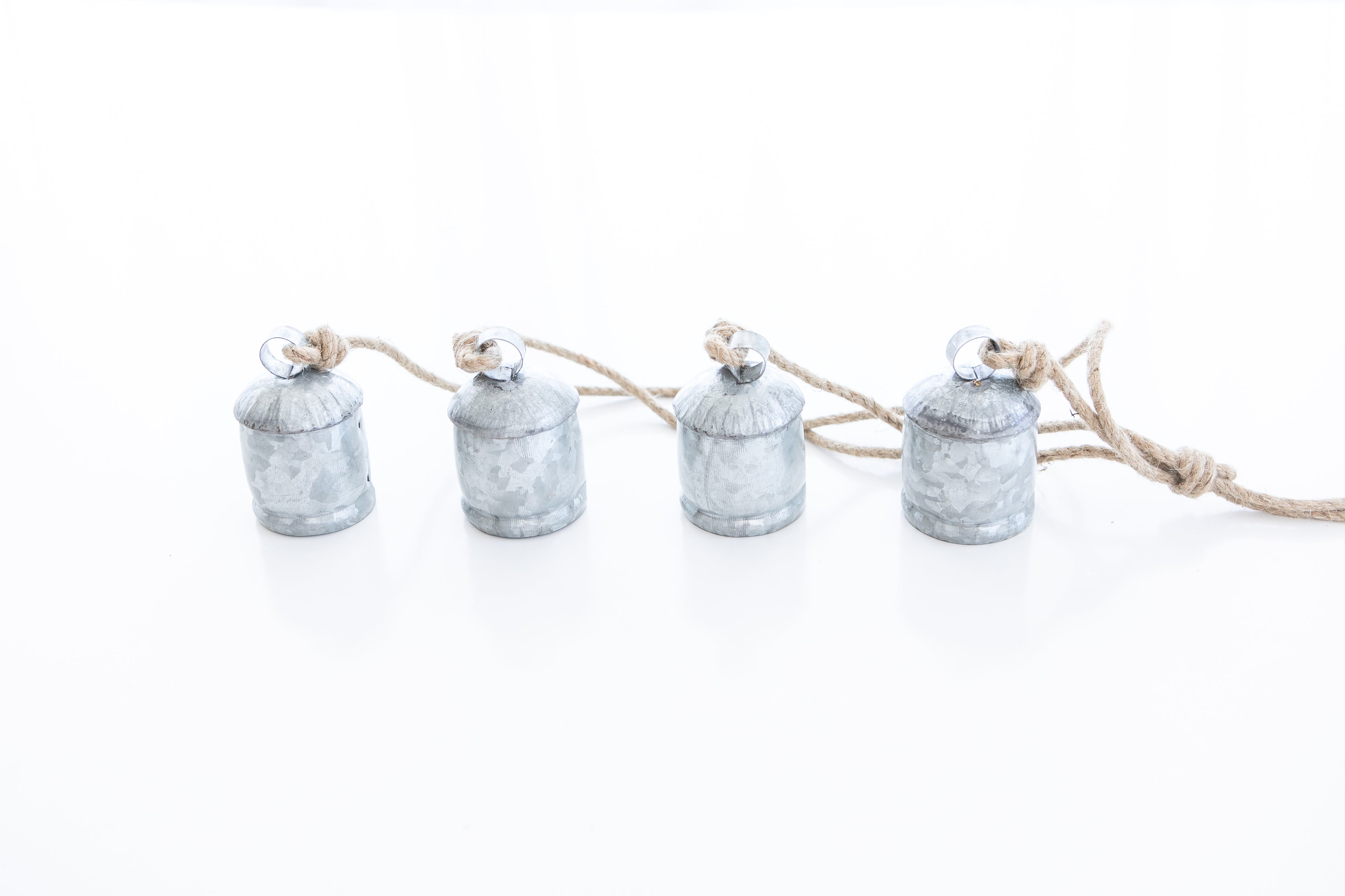 Four Galvanized Bell Tula
