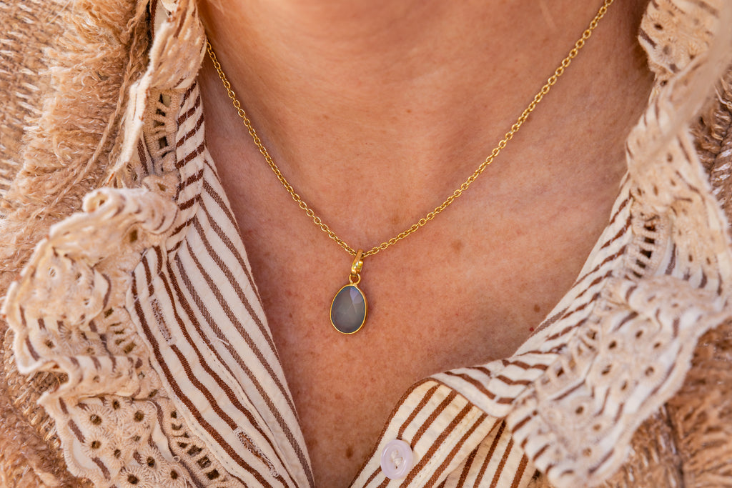 Golden Necklace with Light Blue Onxy Oval Pendant